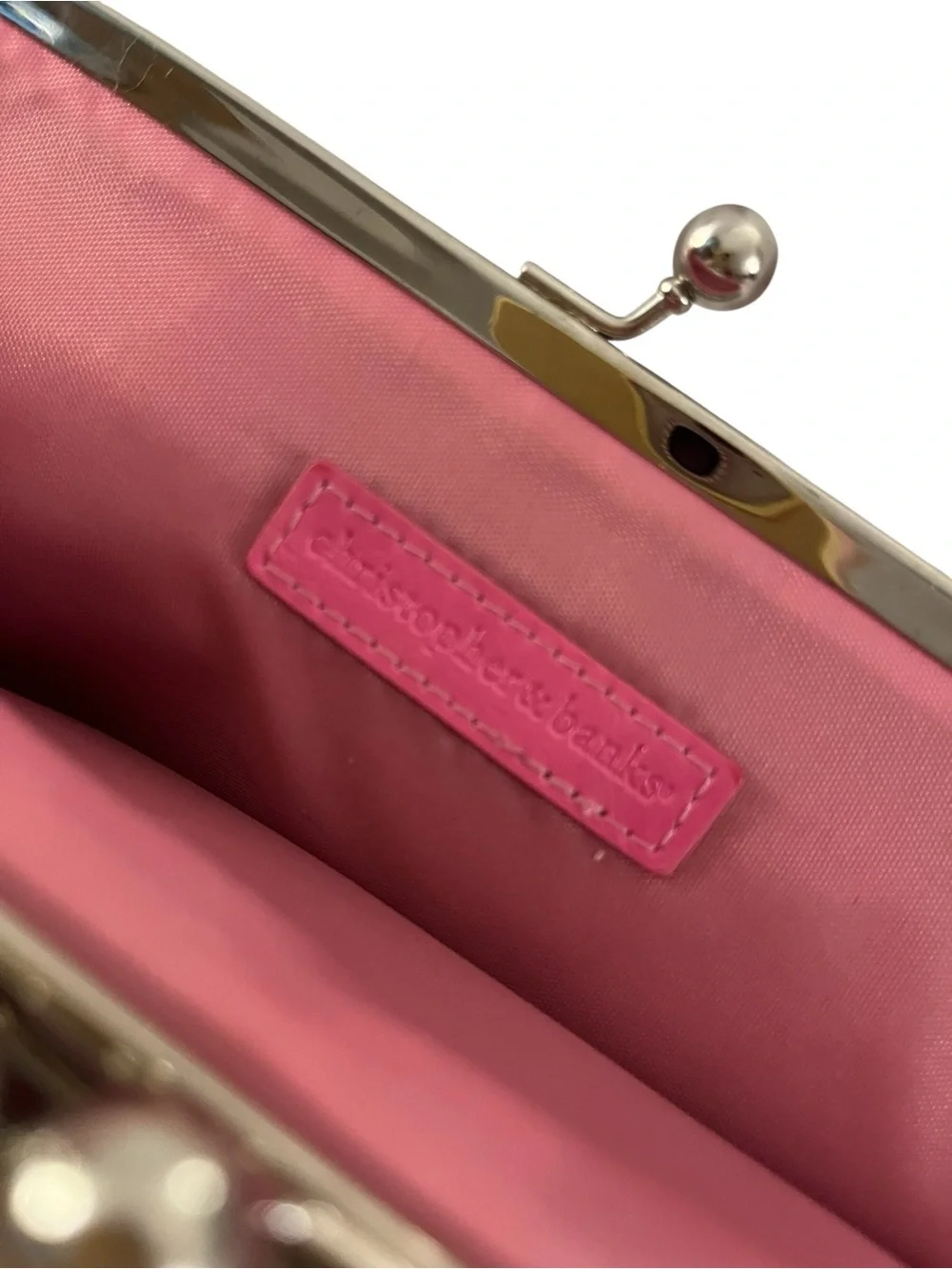 Christopher & Banks clutch features a vibrant multi-color chevron pattern.